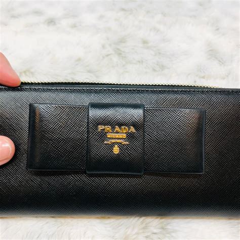 prada zippy wallet.